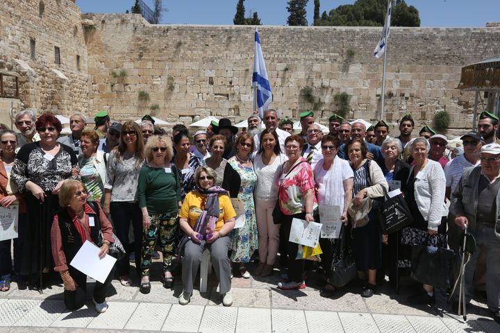 Jews who participated in the ceremony pose for a photo.
