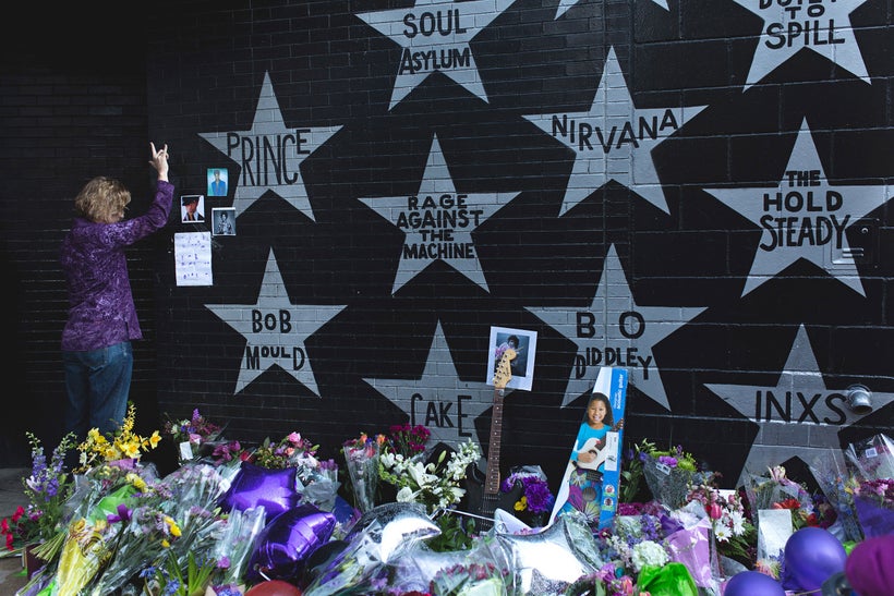 A fan mourns the loss of Prince outside First Avenue—a club he made famous through his movie <i>Purple Rain—</i>j