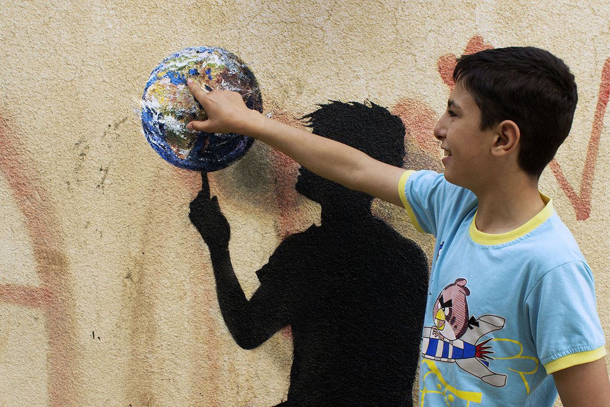 "A big part of Jordan’s population and its future is being determined by and is in the hands of the kids,” says Spanish graffiti artist Pejac.