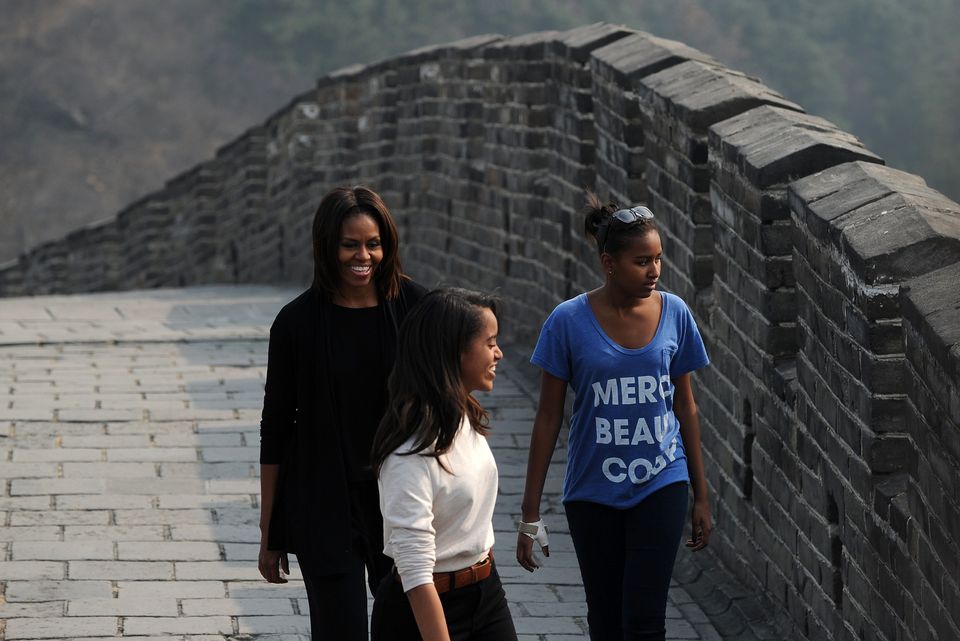 First Lady Michelle, Malia and Sasha Obama spending quality time on the Great Wall of China. NBD.