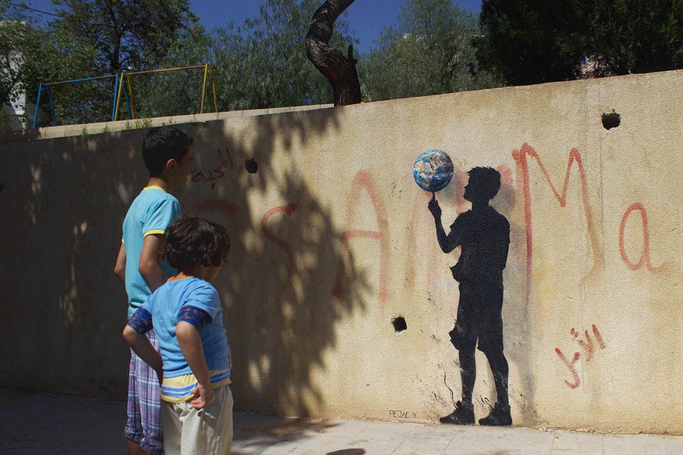 An artwork titled Rotation in the Jabal Al Webdah neighborhood, Amman.