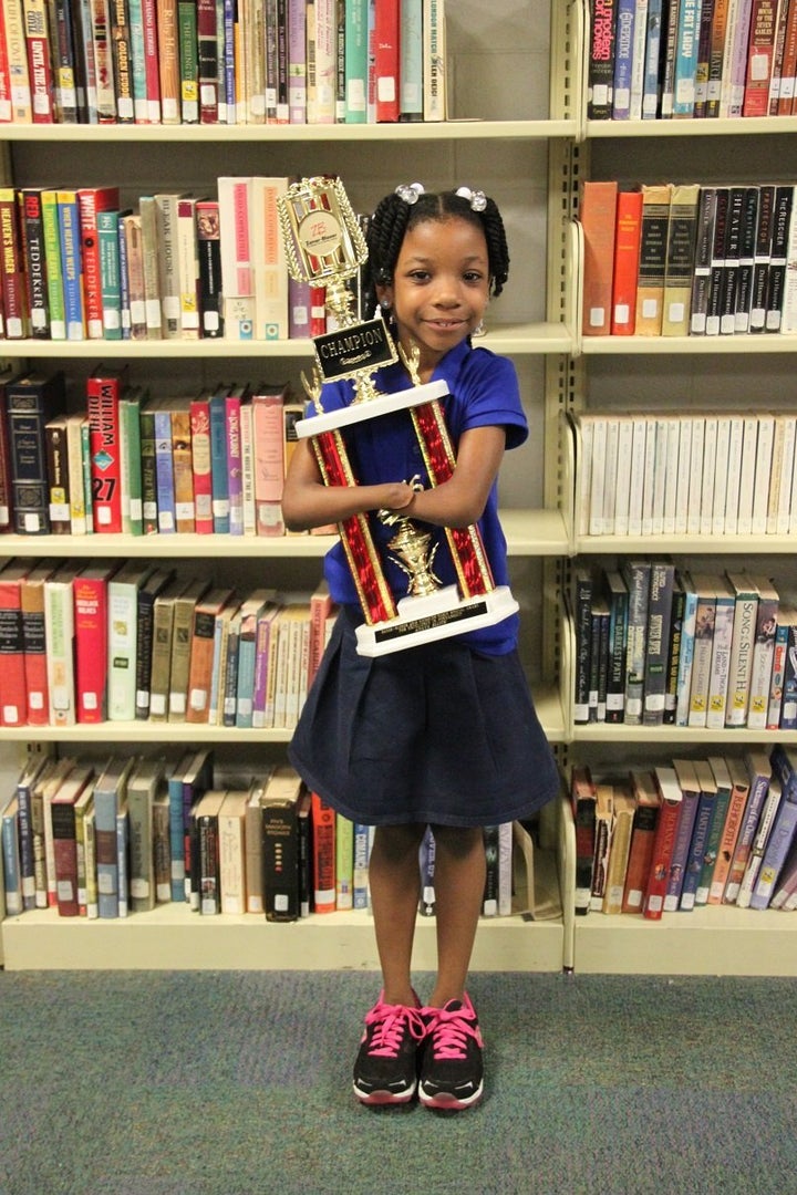 Anaya with her trophy. 