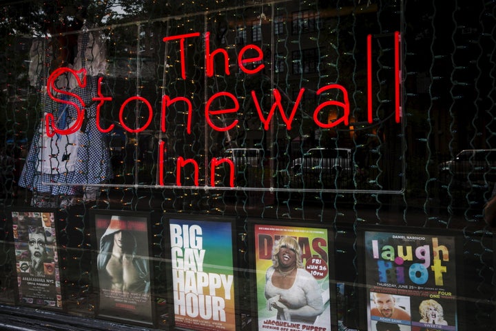 A neon sign shines in the window of the Stonewall Inn in New York on June 23, 2015. The bar, which became a cultural icon due to its pivotal role in the birth of the gay rights movement, will soon be a national landmark.