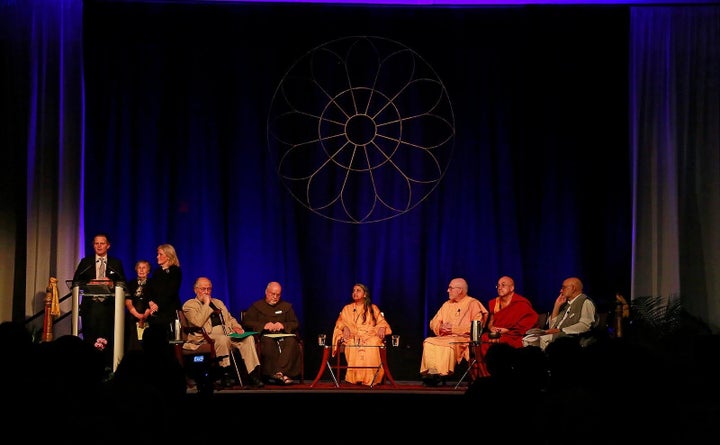 An interfaith panel at the 2013 Festival of Faiths, featuring Owsley Brown III, Kathleen Lyon, Virginia Gray Henry, Seyyed Hossein Nasr, Fr. Richard Rohr, Siddheshvari Devi Ji, Swami Atmarupananda, Mathieu Ricard and Rajiv Mehrotra.