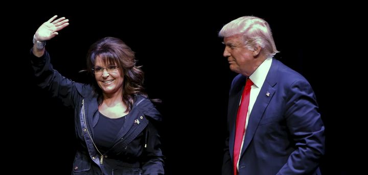 Former Alaska Gov. Sarah Palin (L) introduces Republican U.S. presidential candidate Donald Trump during a town hall on April 2, 2016.