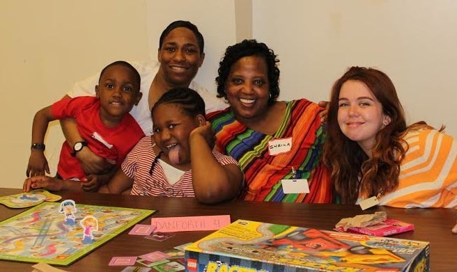 Sheila Hatchett with her grand-niece and grand-nephew during a visit at the Decatur Correctional Facility.