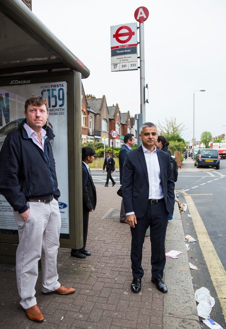 <strong>Ready to touch in: Sadiq Khan waits for the bus in South West London </strong>