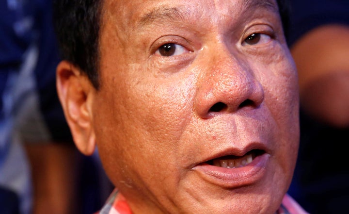 Leading presidential candidate Rodrigo "Digong" Duterte speaks to reporters in Davao city in the southern Philippines on Monday.