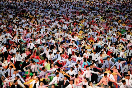 Mesmerizing Photos Show Thousands Of North Koreans Marching In Colorful  Parade | HuffPost The WorldPost