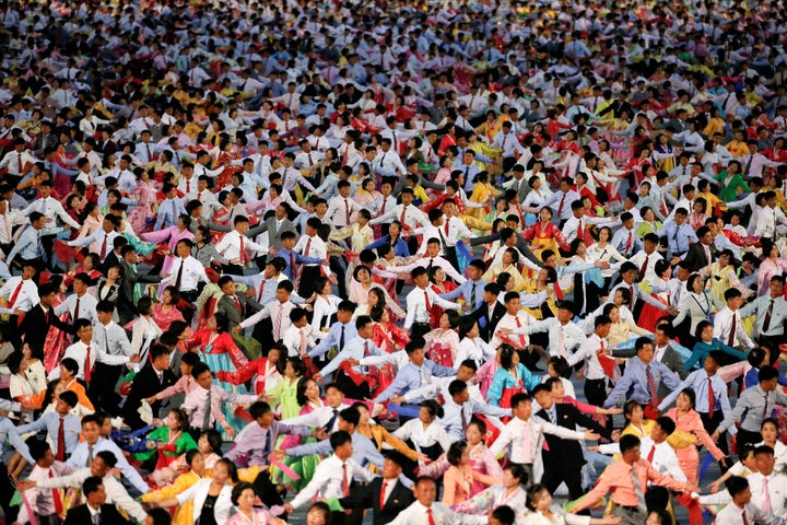 Thousands of people in North Korea marched through the streets on Tuesday as leader Kim Jong Un closed a rare ruling party congress.