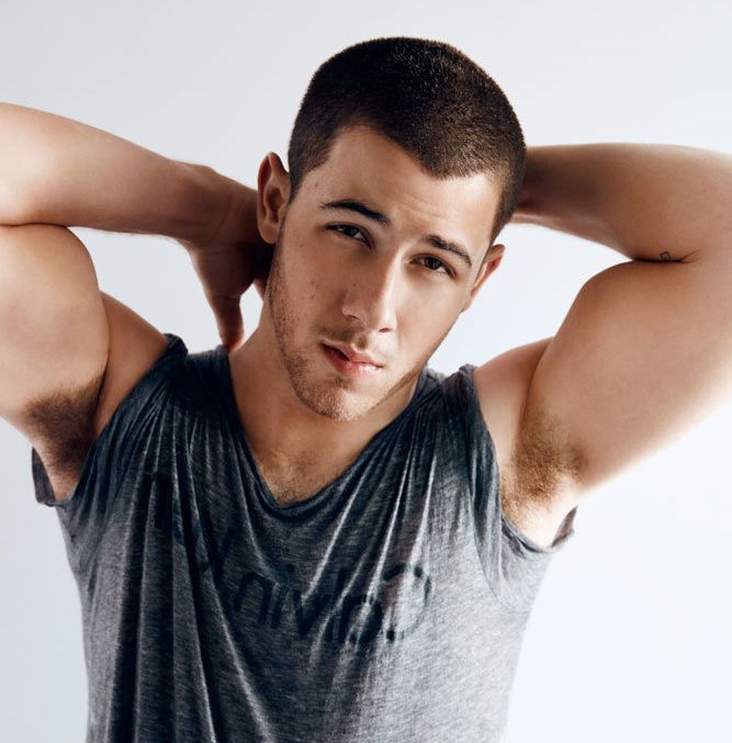 Nick Jonas says he's perplexed by criticism of his appearances at gay clubs. 