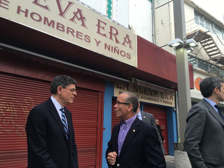 Treasury Secretary Jack Lew talks to the president of Puerto Rico's Chamber of Commerce, José Vazquez Barquet, about the debt crisis' toll on businesses.
