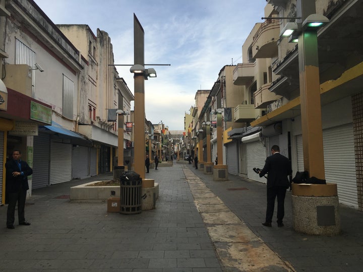 The Paseo de Diego Pedestrian Corridor, a once bustling business district, is all but empty on a Monday afternoon.