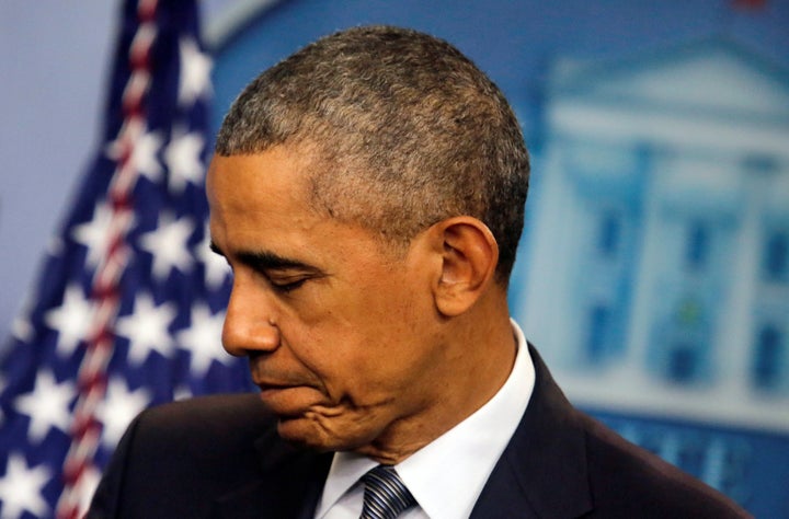 U.S. President Barack Obama leaves after delivering a statement on the economy at the press briefing room at the White House