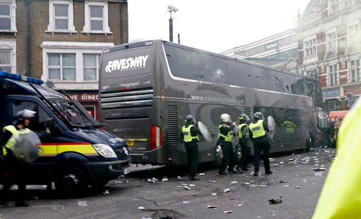 <strong>Bottles were thrown at the Manchester United team bus ahead of the match at Upton Park</strong>