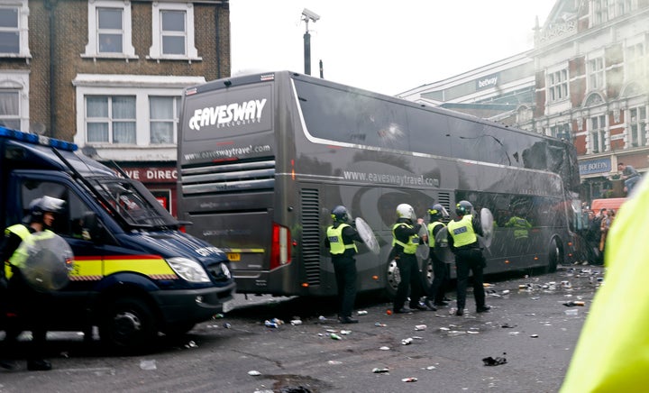 <strong>Bottles were thrown at the Manchester United team bus ahead of the match at Upton Park</strong>