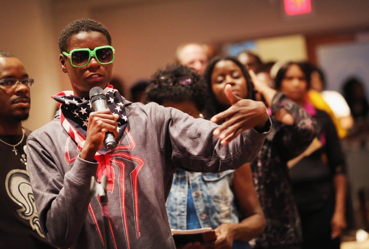 Williams became well known in and around Ferguson during the protests for wearing neon-green sunglasses and an American flag bandana, as he gave passionate speeches during rallies.