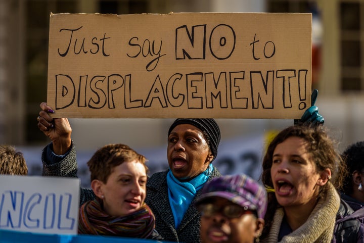 Housing groups protest Mayor Bill de Blasio's affordable housing plan at City Hall in March.