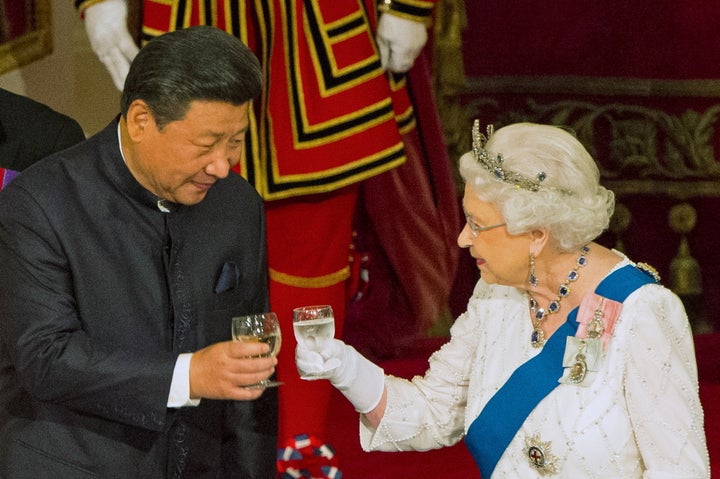 Chinese President Xi Jinping with Queen Elizabeth II at a state banquet at Buckingham Palace in October. British Prime M