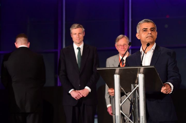Paul Golding turns his back on Khan during his victory speech.