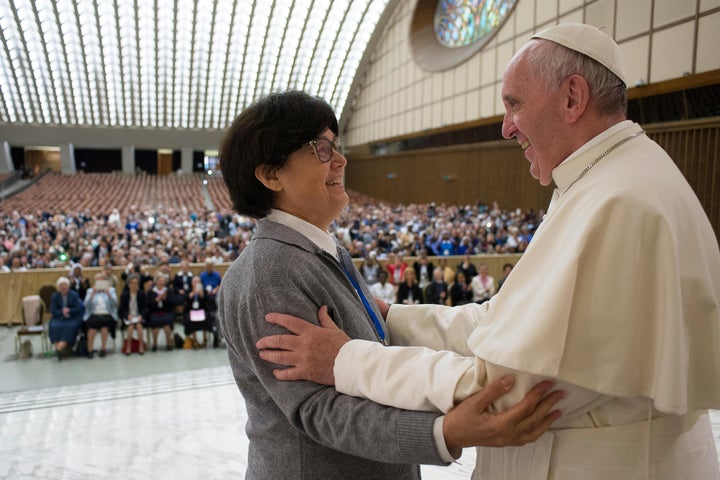 Pope Francis is greeted by Sister Carmen Sammut, a Missionary Sister of Our Lady of Africa, during an audience with the 