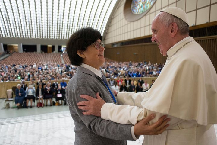 Pope Francis is greeted by Sister Carmen Sammut, a Missionary Sister of Our Lady of Africa, during an audience with the International Union of Superiors General at the Vatican, May 12, 2016.