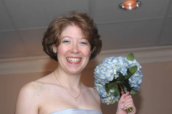 Lori Jackson, pictured at her sister's wedding in 2009, was shot by her estranged husband in Connecticut.