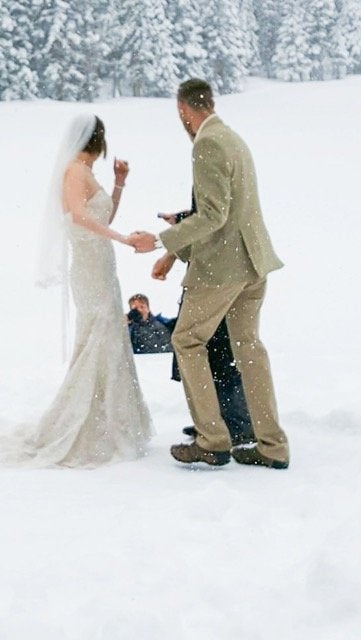 Brad and Tara Peters' wedding photographer fell into Bear Lake in the middle of their wedding ceremony at Colorado's Rocky Mountain National Park.