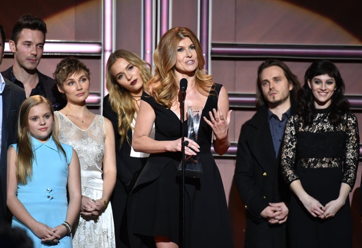 Actress Connie Britton (Center) and the cast of ABC's "Nashville" receive an award onstage during the 2015 "CMT Artists of the Year" in December 2015.