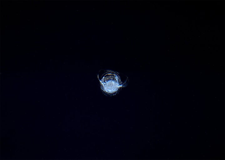 A tiny crack in the window of the International Space Station. 