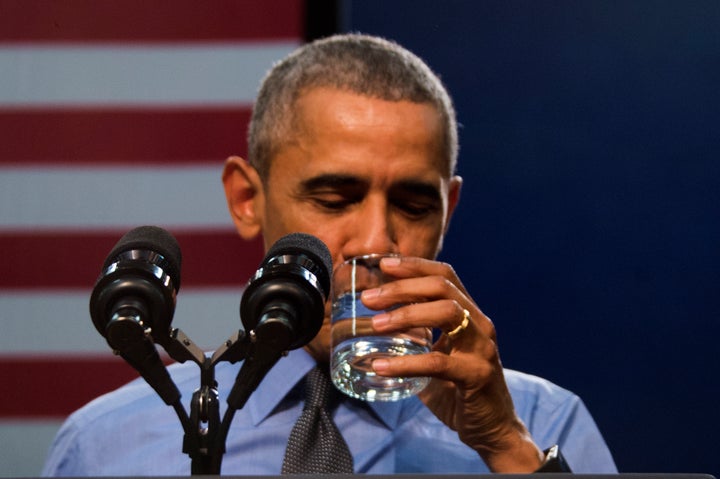 Michael Moore said he was upset after President Barack Obama was pictured drinking a glass of filtered Flint water.