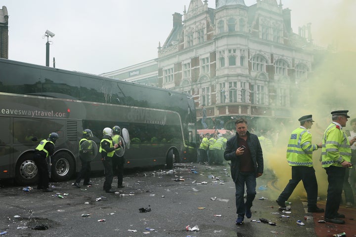 A 28-year-old man has been arrested by detectives investigating the attack on the Manchester United team bus on Tuesday