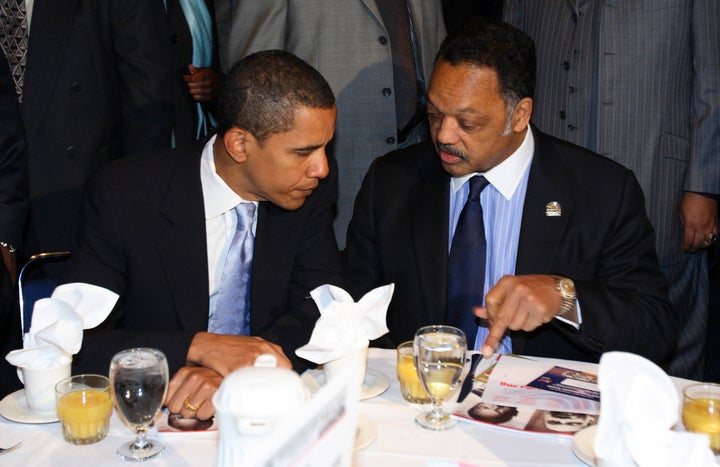 Then-Sen. Barack Obama (D-Ill.) talks with Rev. Jesse Jackson Sr. in Chicago Jan. 15, 2007.