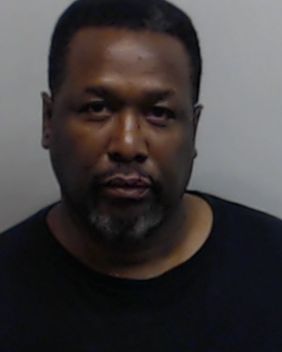 Pierce, shown in this mug shot, was charged with simple battery following the alleged altercation at a hotel in Atlanta.