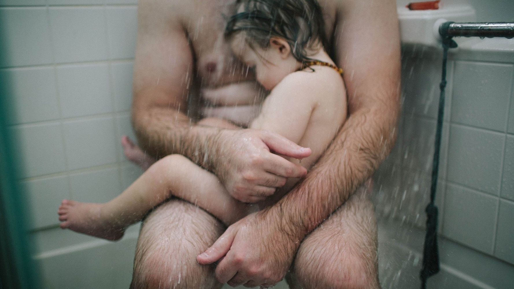 Powerful Photo Of Dad Cradling Sick Son In Shower 'Removed B
