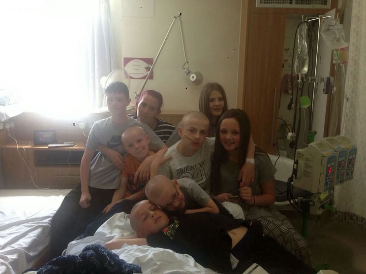 <strong>Kallum Aish pictured in hospital with his friends</strong>