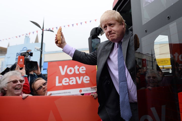 Johnson brandishes a pasty from the 'Vote Leave' bus as he sets out his vision for a Britain outside the EU