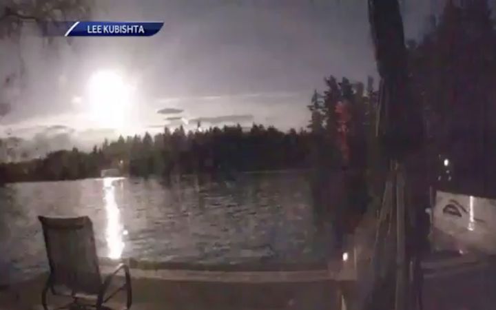 One video captured the massive fireball lighting up a lake.