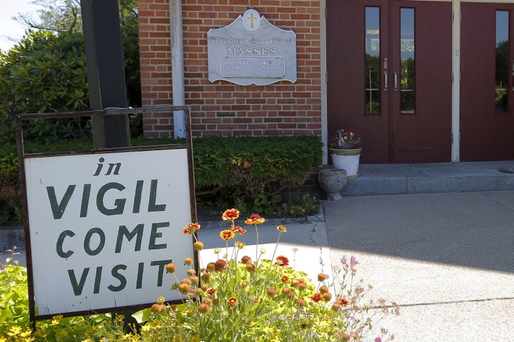 A sign marks the vigil at St. Frances Xavier Cabrini Roman Catholic church in Scituate.