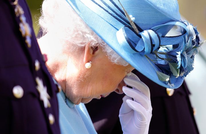 Queen Elizabeth II sheds a tear at an unveiling of a new memorial.