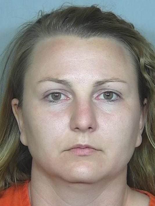 Rachel Einspahr was arrested Friday after allegedly robbing a bank via the drive-through. Two kids she was babysitting were in the back seat.