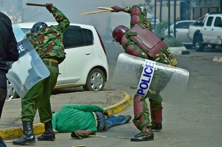 Kenyan security forces were captured on camera beating an unresponsive man lying in the street at a protest on Monday. T