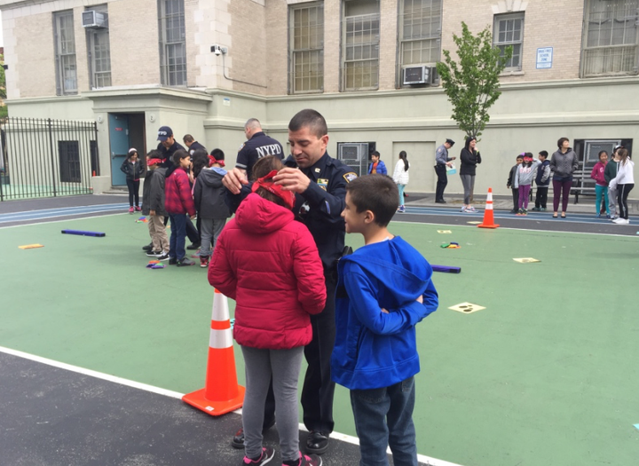 Police officers spent time at elementary schools around New York City on Tuesday to help encourage positive relationships between law enforcement and kids in the city.