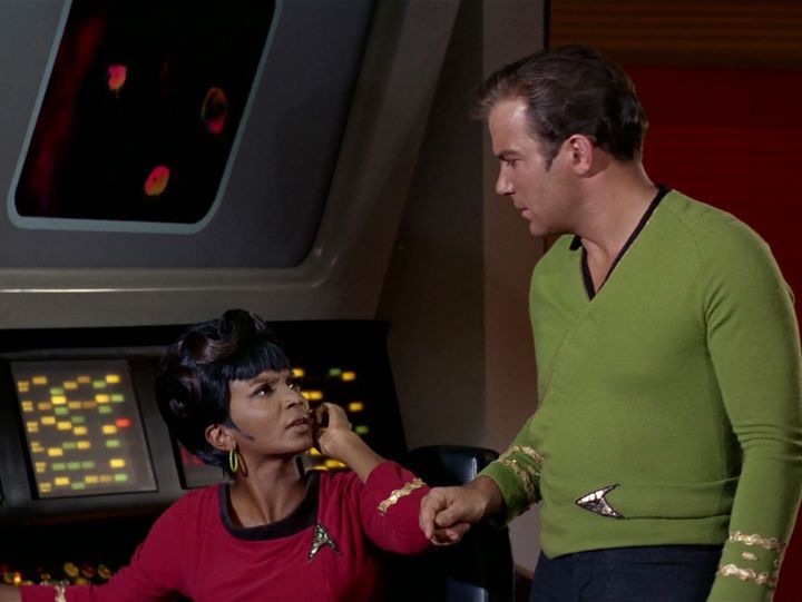 Nickel Nichols as Lieutenant Nyota Uhura in the Star Trek episode Journey to Babel and Captain James T.  William Shatner as Kirk, originally broadcast on November 17, 1967.