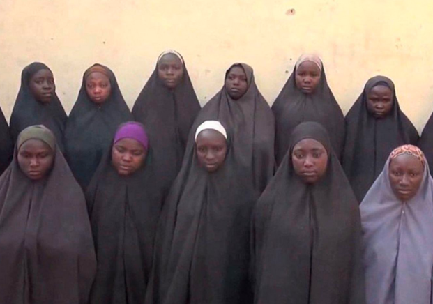 <strong>Footage, apparently taken in December, appears to show some of the girls are alive.</strong>