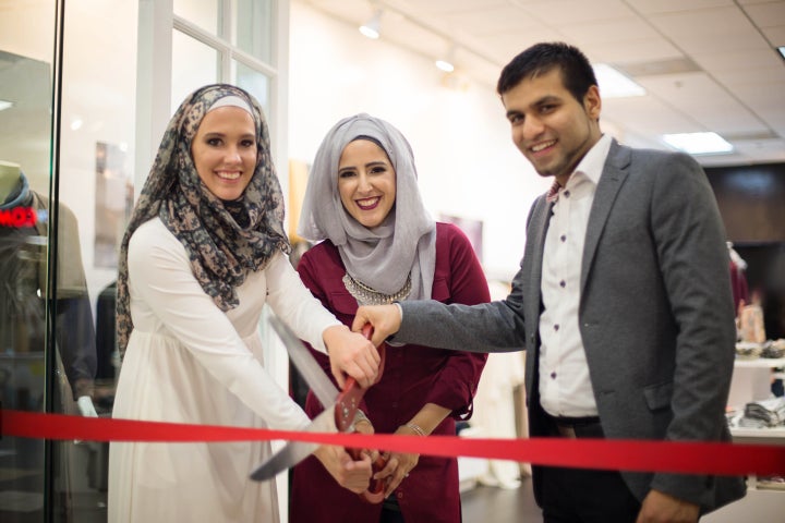 From left to right: Lisa Vogl, Nadine Abu-Jubara, and Hassan Mawji at the opening day ceremony for the Verona Collection.