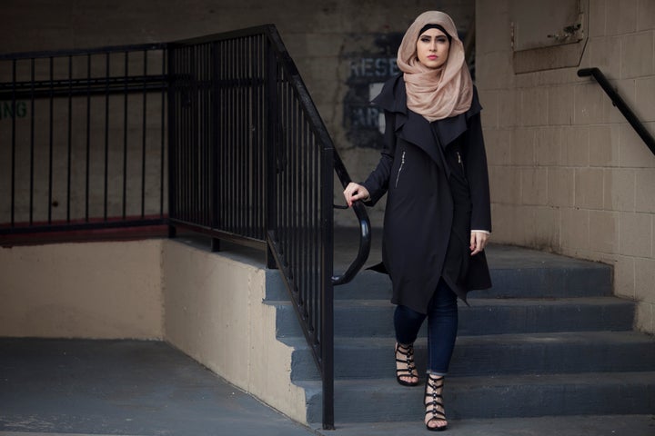 Model Sarah Al Ramahi wears a Verona Collection cardigan.