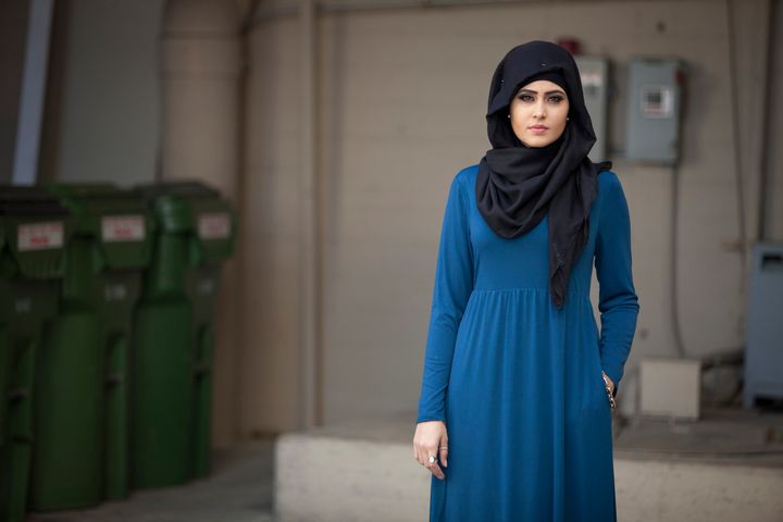 Model Sarah Al Ramahi poses in a blue Verona dress.
