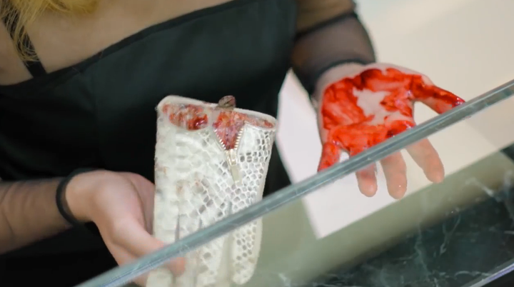 <strong>Shoppers' hands and feet were left covered in blood when they tried to put on the exotic skin garments.</strong>