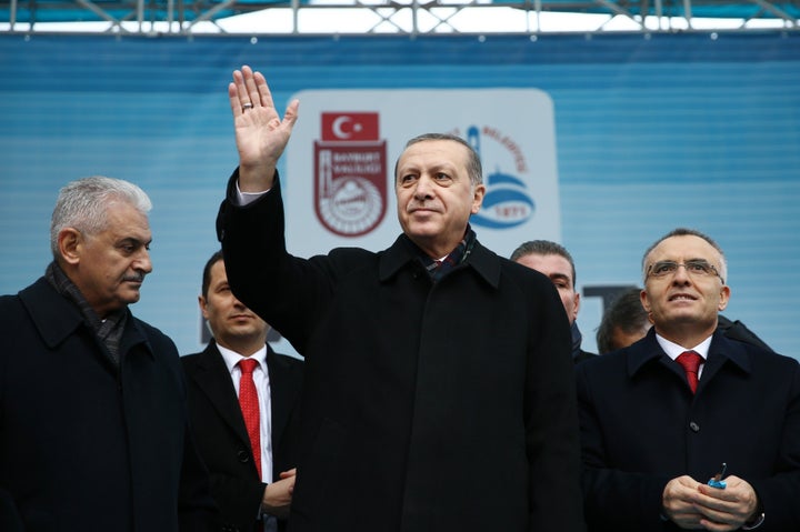 Transport Minister Binali Yildirim (L) is set to become Turkey's new prime minister, cementing President Tayyip Erdogan's (C) hold on power. The pair are pictured here last November with finance minister Naci Agbal.